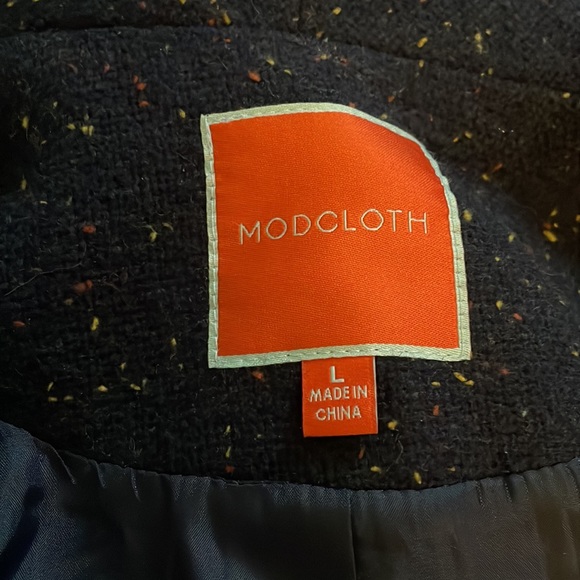 Navy blue vest with specks of yellow and red design. - Picture 4 of 6